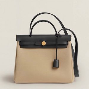 Brand new herbag! With tags, dust bag, box never worn!